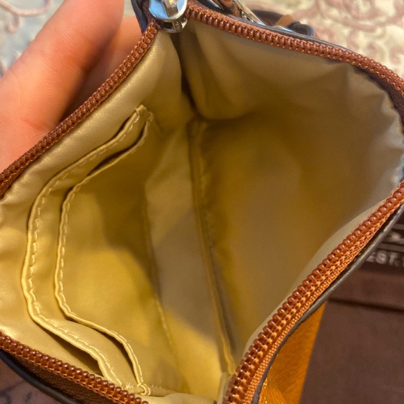 Pebble grain soft leather Coach wristlet. Tan. - Picture 3 of 3